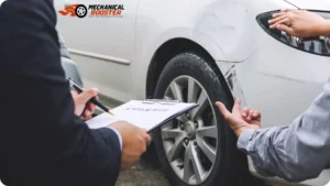 Insurance agent inspecting car damage and filling out an insurance claim report after a minor car accident.